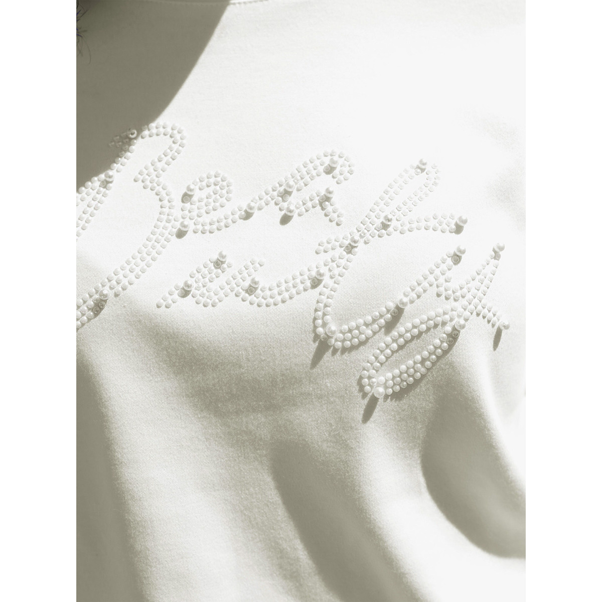 Sweatshirt m. Schriftzug und Zierperlen ecru
